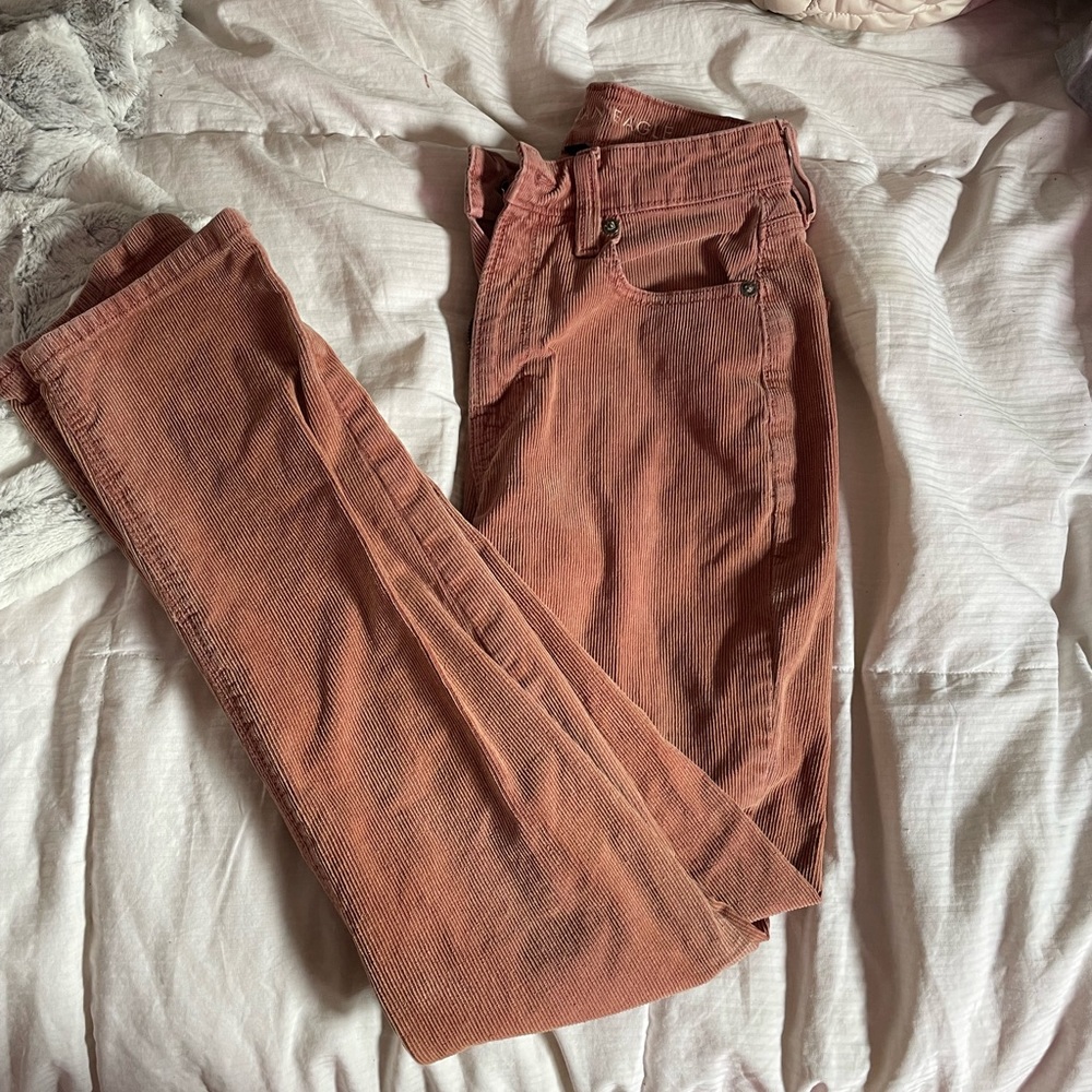 Salmon coloured jeans